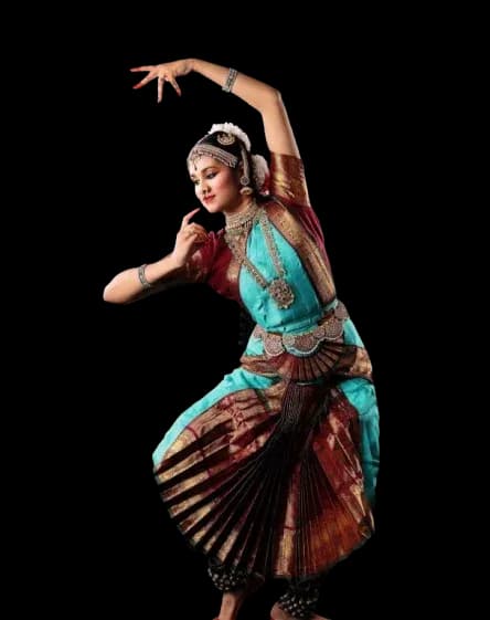 Bharathanatyam dancers in a flowing sequence of poses